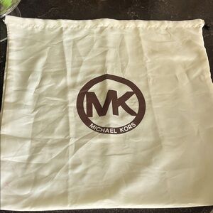 EUC Michael Kors, large satin, cream dust bag with brown logo 18.5" x 18.5"